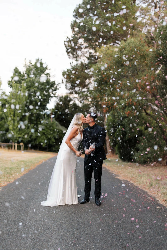 Wedding Confetti cannon being used.